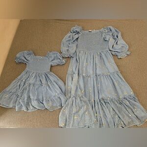 Elegant Blue Maxi Dress with Gold Accents